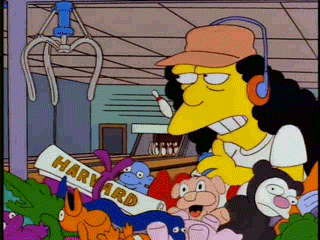 A gif from The Simpsons of Otto, with long black hair and peach coloured hat with blue headphones on, playing the claw game with stuffed toys below and a degree reading HARVARD across it.